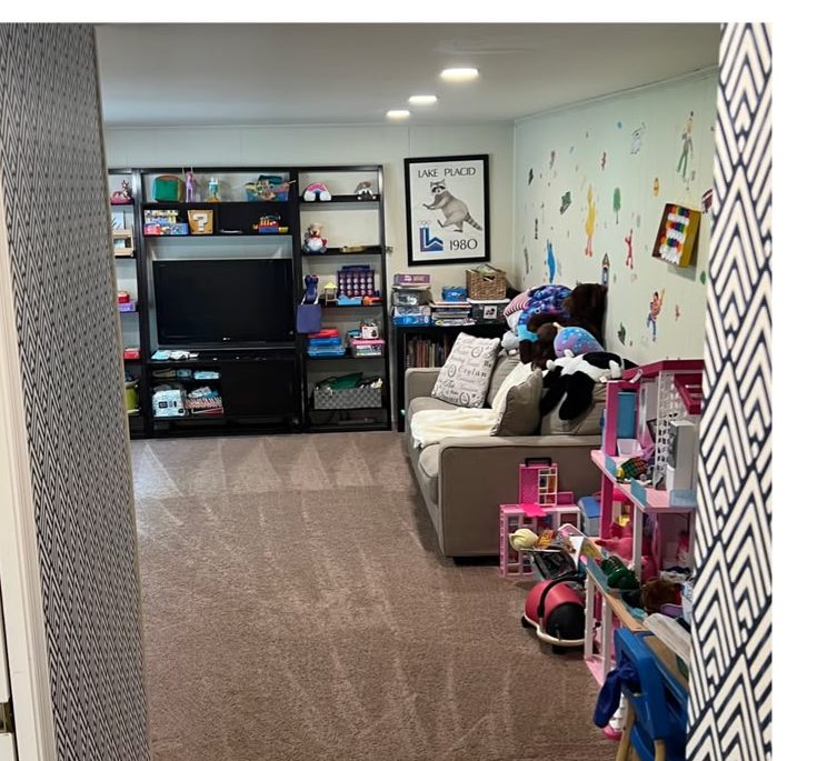 Playroom after cleaning: carpet vacuumed, toys put away